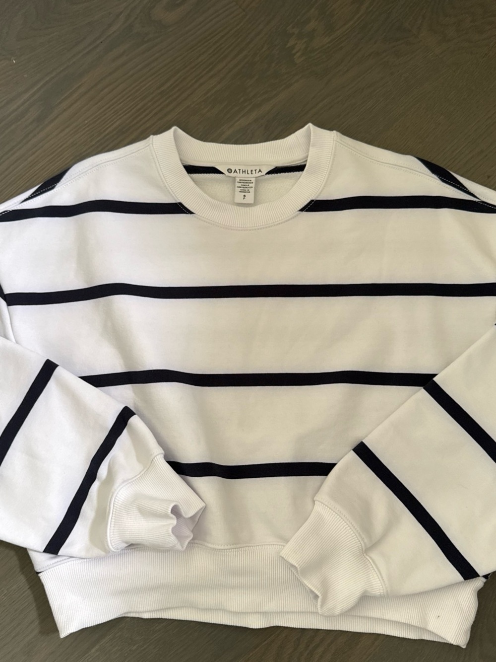 Athleta Women’s White Crewneck Sweatshirt with Navy Stripes.
